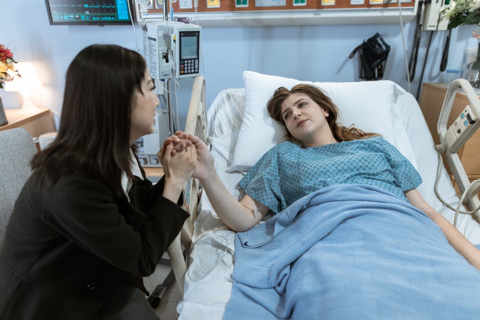 A comforting hospital visit with a patient receiving support from a friend.